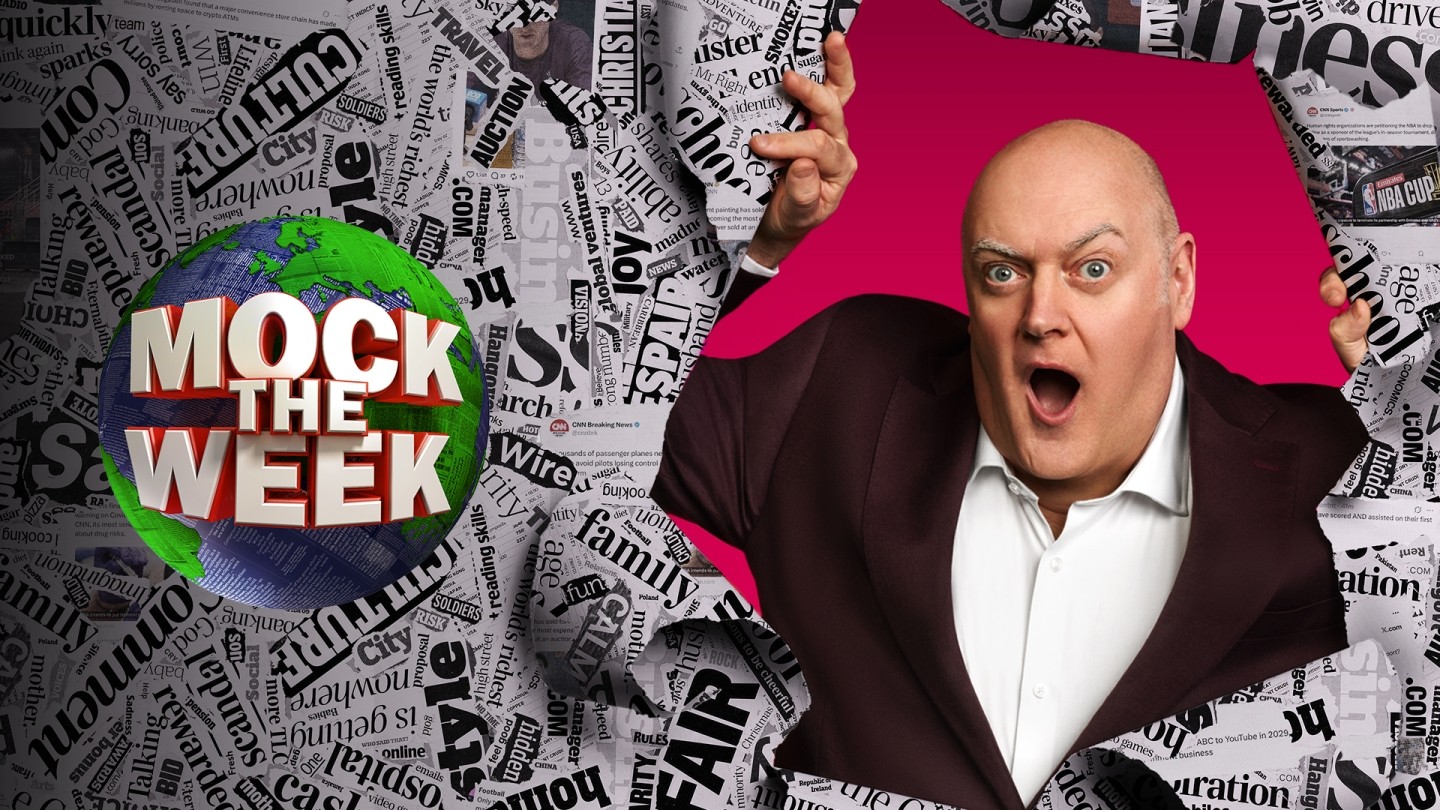 romotional image for Mock the Week featuring a person tearing through a collage of black-and-white newspaper headlines, revealing a bright pink background behind them. On the left side, the show’s logo displays the words ‘Mock the Week’ in bold red and white letters over a green and blue globe.