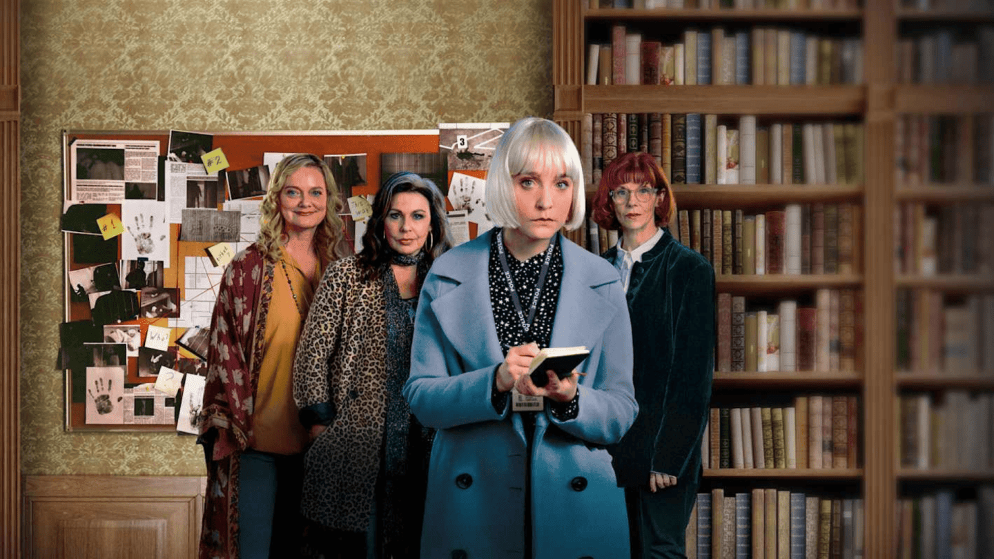 Group of investigators standing in a library, with one person writing in a notebook while a detailed evidence board filled with photos and notes is displayed on the wall behind them.