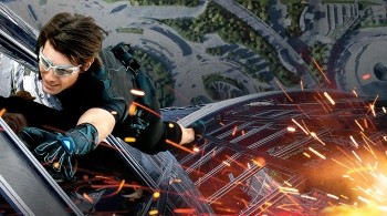Image shows Tom Cruise in Mission Impossible Ghost Protocol