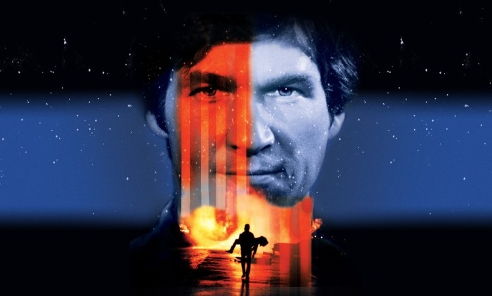 Jeff Bridges in Starman with his face in the background and carrying a women in the foreground