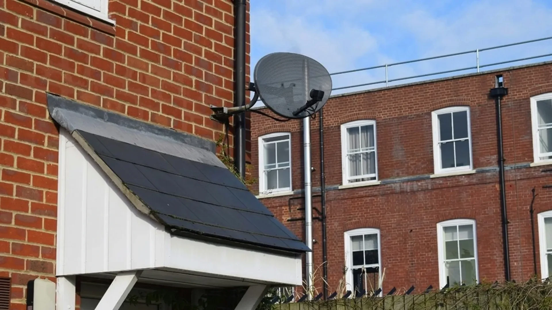 A photo of a satellite dish on a house