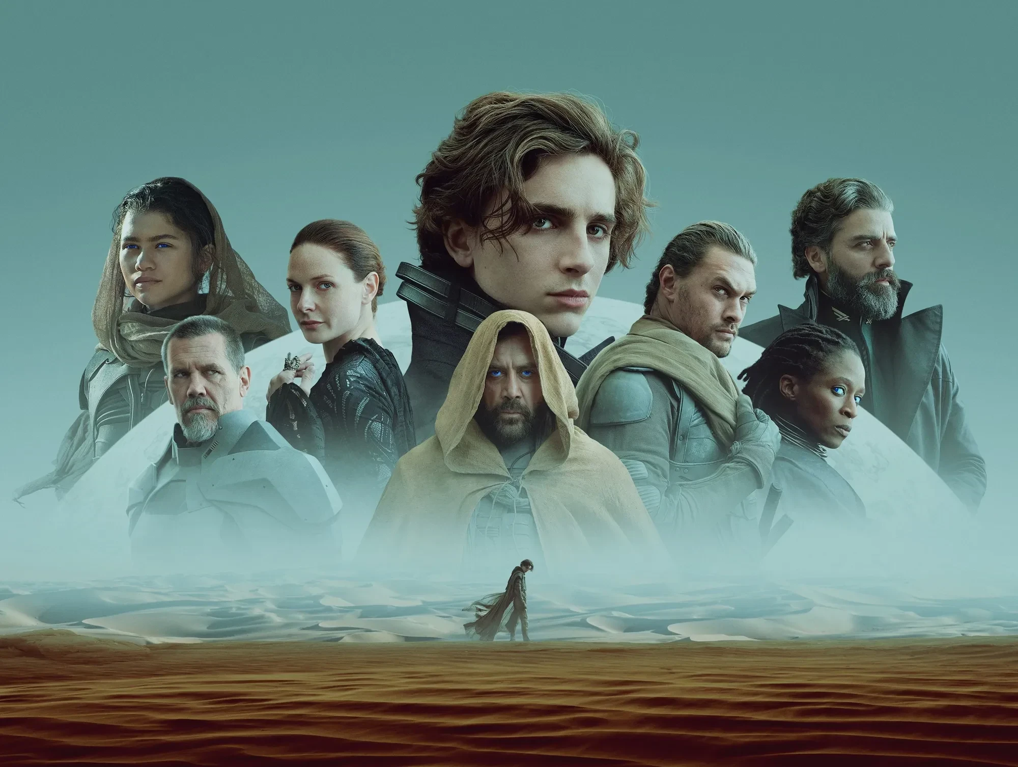 Promotional image for Dune (2021) shows lead actors against a mysterious desert background