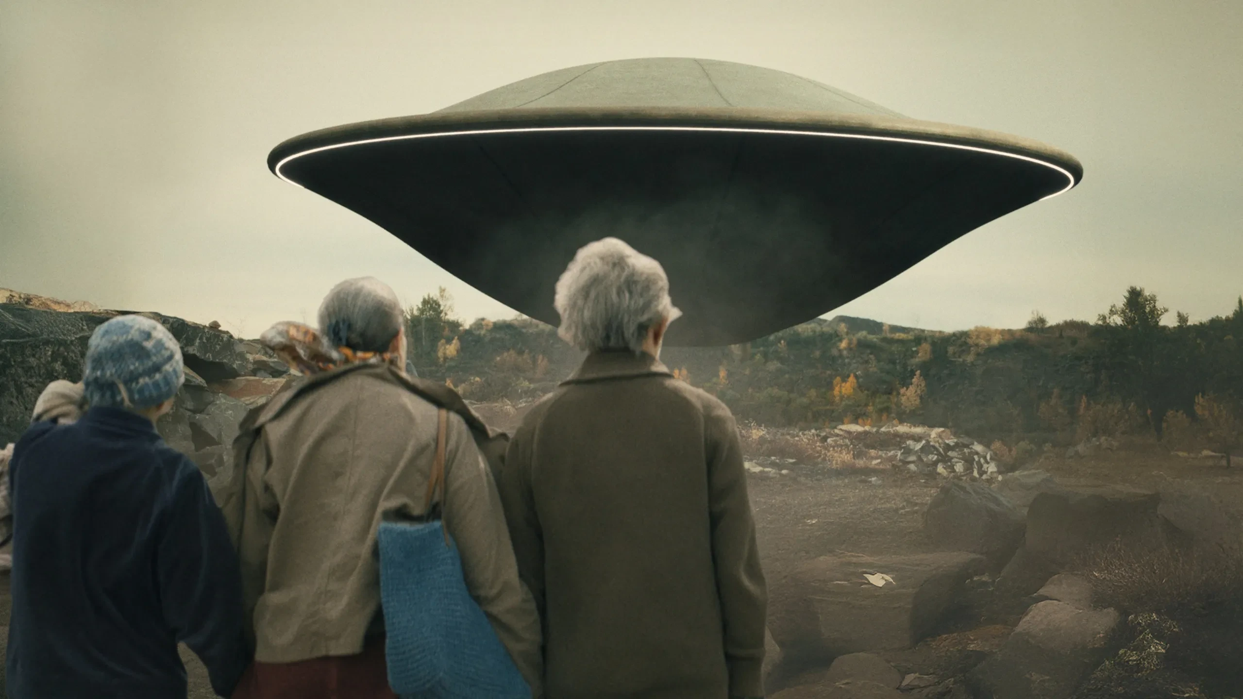 Image shows the cast of Jules (2023) from behind