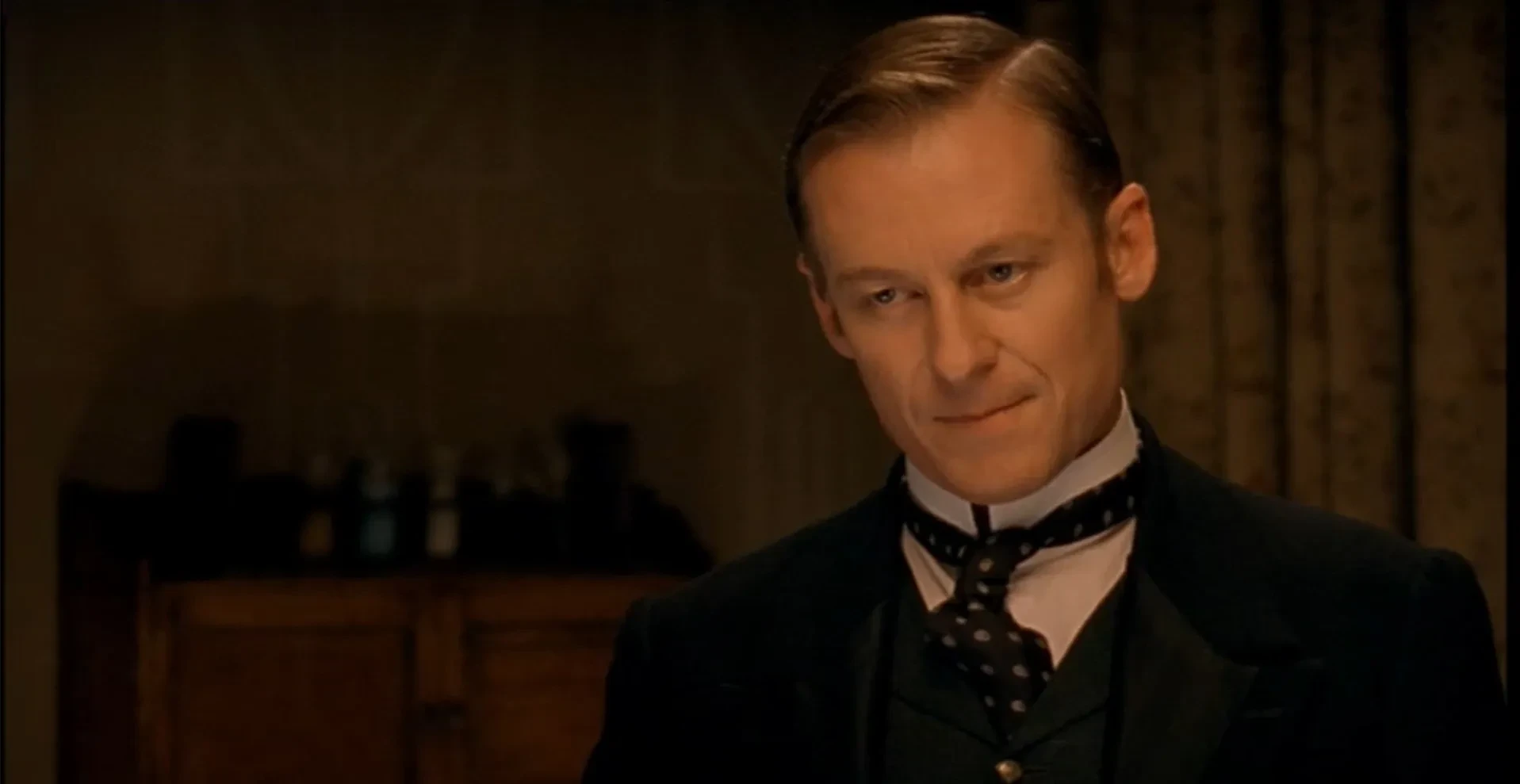 A film still from the 2002 TV adaptation of The Hound of the Baskervilles, featuring Richard Roxburgh as Sherlock Holmes