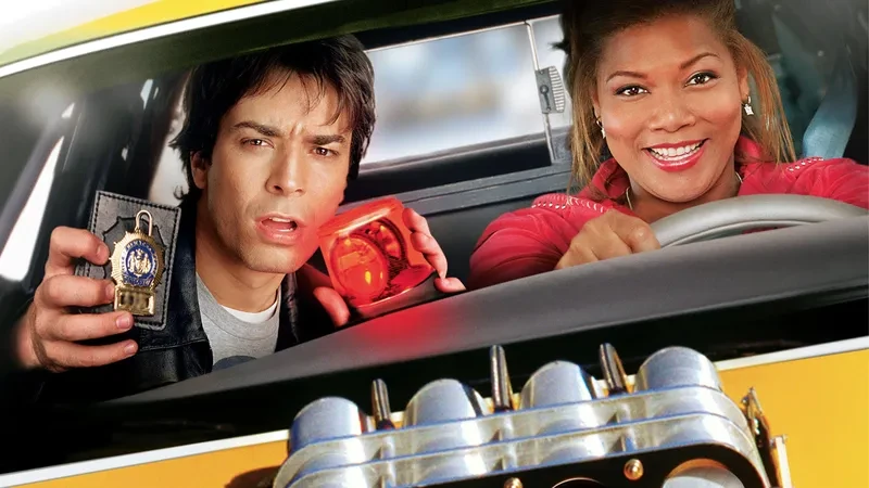 Promotional image for Taxi shows Queen Latifah and Jimmy Fallon driving a taxi